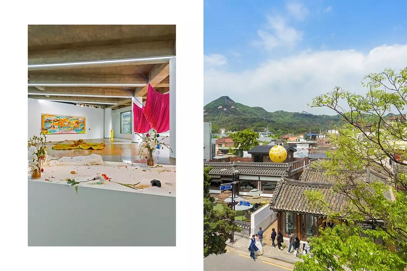 Từ trái: Tác phẩm sắp đặt của Boma Pak (tiền cảnh), tác phẩm điêu khắc bằng vải treo của Hannah Woo và bức tranh của Rondi Park (trên bức tường phía xa) tại phòng trưng bày Trung tâm Nghệ thuật Sonje; phía bắc Seoul, với Công viên Quốc gia Bukhansan ở phía xa, nhìn từ Trung tâm Nghệ thuật Sonje